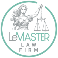 Lady Justice logo for LeMaster Law Firm, featuring scales and artistic text.