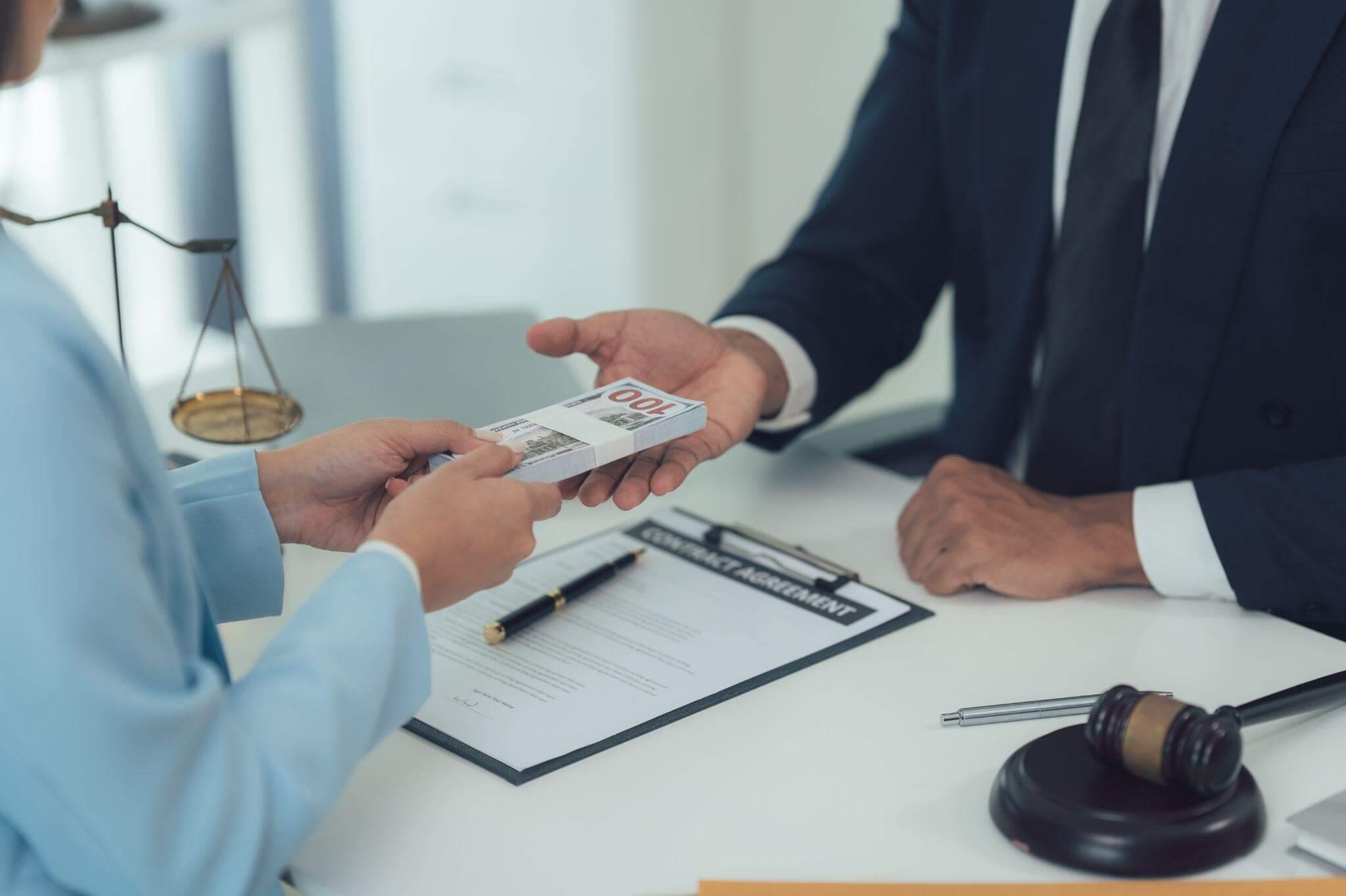 a judge and a woman sitting at a table