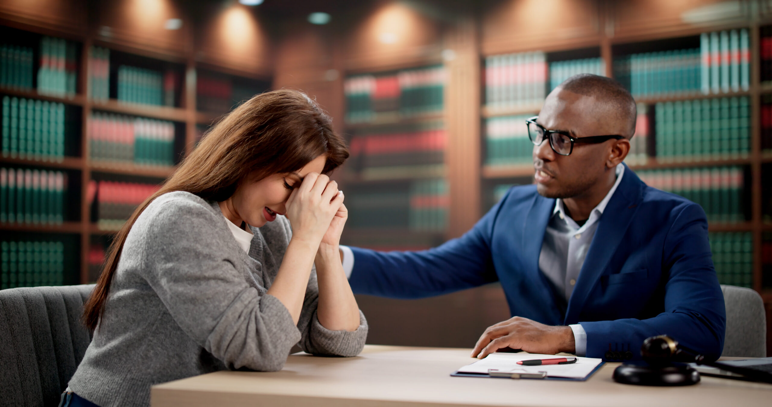 Young Woman Meets Lawyer To Discuss Wrongful Death Case