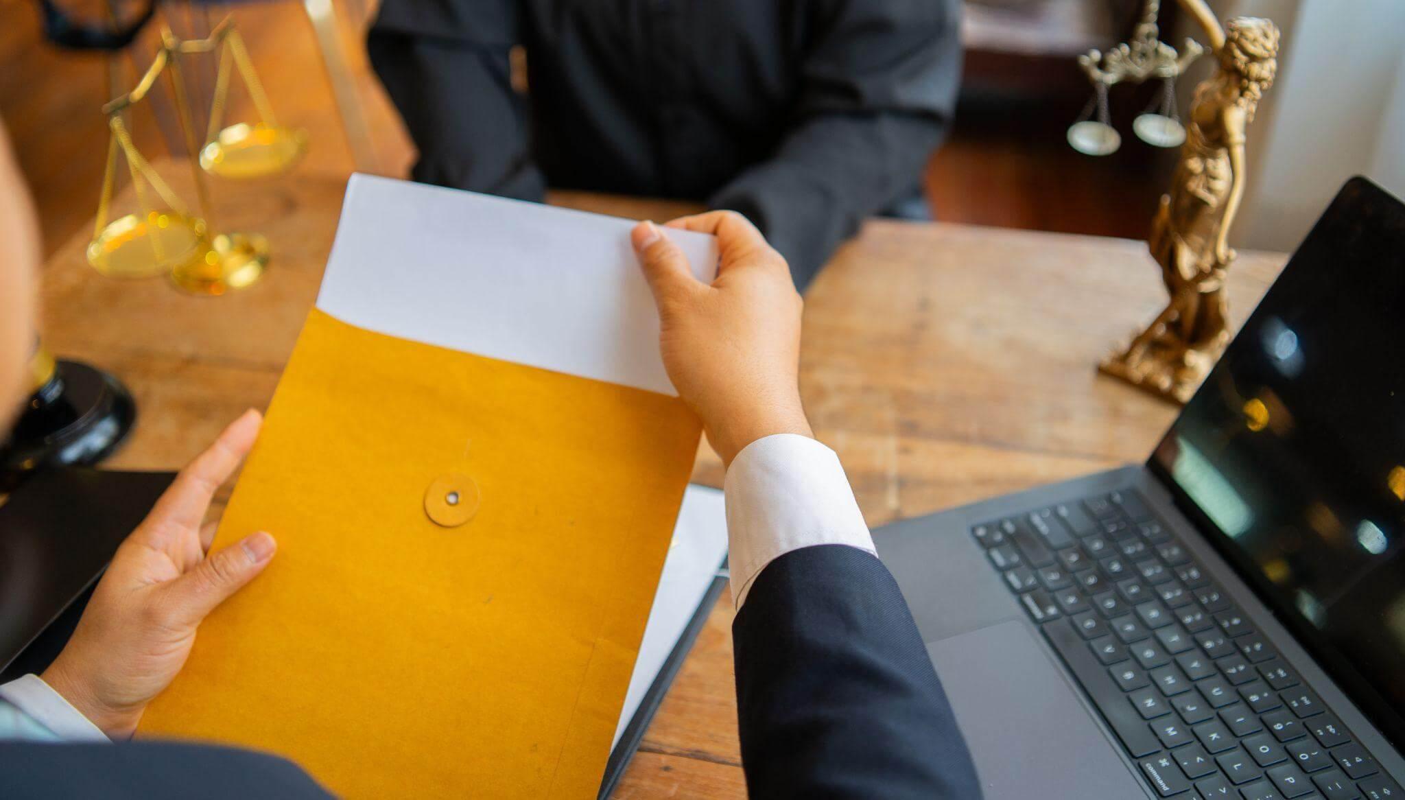 Client reviewing legal document with a wrongful death